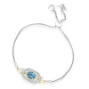 Enchanted Disney Fine Jewelry Sterling Silver and 10K Yellow Gold 1/5 CTTW Diamond and Swiss Blue Topaz Jasmine Bracelet
