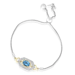 Enchanted Disney Fine Jewelry Sterling Silver and 10K Yellow Gold 1/5 CTTW Diamond and Swiss Blue Topaz Jasmine Bracelet