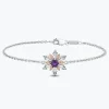 Enchanted Disney Fine Jewelry Sterling Silver and 10K Rose Gold Diamond Accent with Blue Topaz and Rose-De-France Elsa Snowflake Bracelet