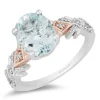 Enchanted Disney Fine Jewelry 10K White Gold and Rose Gold with 1/6 CTTW Diamond and Aquamarine Elsa Engagement Ring