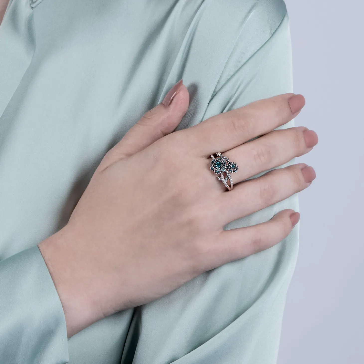 Enchanted Disney Fine Jewelry Sterling Silver with 1/6 CTTW Diamond and London Blue Topaz Cinderella 70th Gardenia Flower Ring