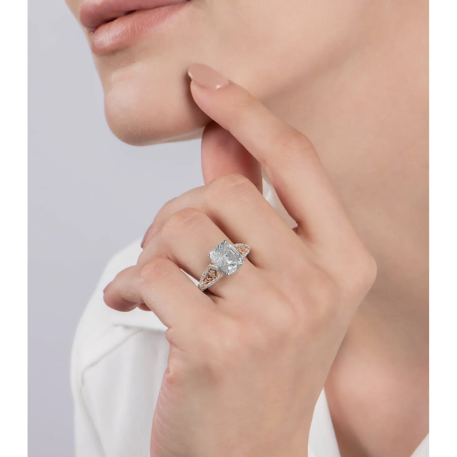 Enchanted Disney Fine Jewelry Sterling Silver and 10K Rose Gold with 1/6 CTTW Diamond with Aquamarine Elsa Ring