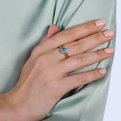 Enchanted Disney Fine Jewelry Sterling Silver and 10K Yellow Gold with 1/10 CTTW Diamond and Swiss Blue Topaz Brave 10th Anniversary Collectors Merida Halo Ring