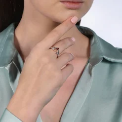 Enchanted Disney Fine Jewelry Sterling Silver and 10K Rose Gold 1/15 CTTW Diamond And Garnet Snow White Bow Ring