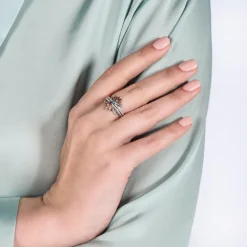 Enchanted Disney Fine Jewelry Sterling Silver and 10K Rose Gold With 1/5 CTTW Diamond with Round Swiss Blue Topaz and Rhodolite Garnet Elsa and Anna Duo Stack Ring