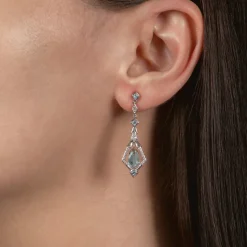 Enchanted Disney Fine Jewelry Sterling Silver with 1/8 CTTW Diamond and Swiss Blue Topaz Elsa Dangling Earrings